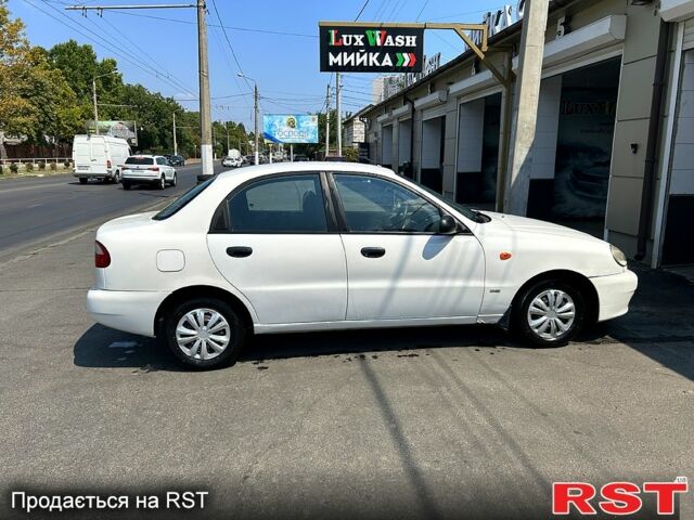 Белый Дэу Ланос, объемом двигателя 1.5 л и пробегом 245 тыс. км за 2200 $, фото 2 на Automoto.ua