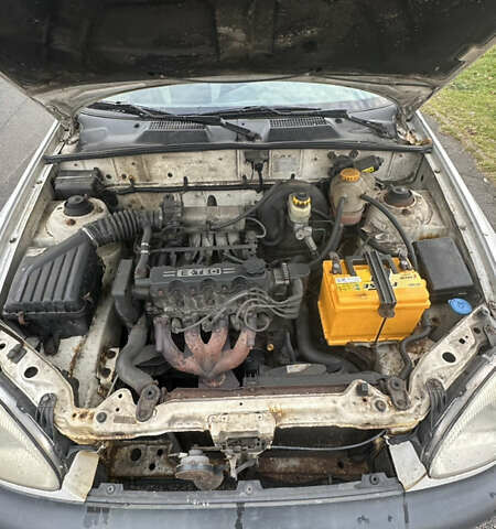 Білий Деу Ланос, об'ємом двигуна 1.5 л та пробігом 556 тис. км за 1800 $, фото 11 на Automoto.ua