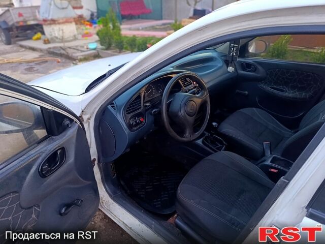 Белый Дэу Ланос, объемом двигателя 1.5 л и пробегом 325 тыс. км за 1500 $, фото 6 на Automoto.ua