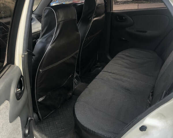 Белый Дэу Ланос, объемом двигателя 1.5 л и пробегом 268 тыс. км за 1300 $, фото 5 на Automoto.ua