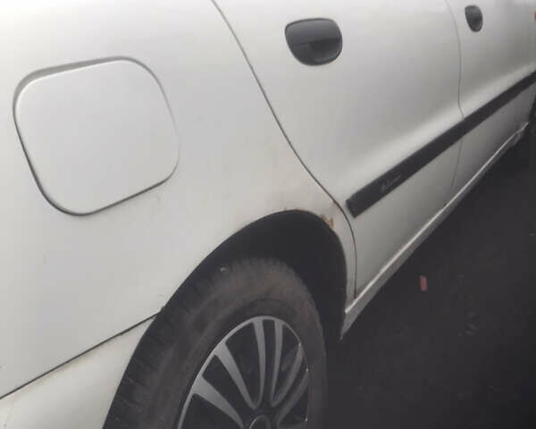 Белый Дэу Ланос, объемом двигателя 1.5 л и пробегом 353 тыс. км за 2200 $, фото 10 на Automoto.ua