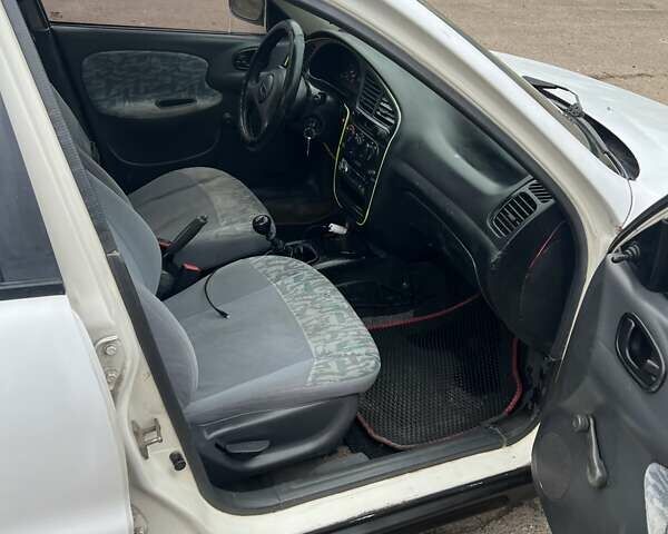 Білий Деу Ланос, об'ємом двигуна 1.5 л та пробігом 215 тис. км за 1400 $, фото 4 на Automoto.ua