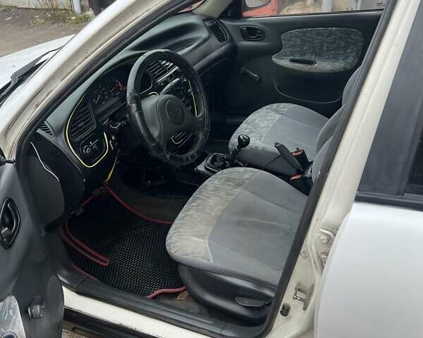 Білий Деу Ланос, об'ємом двигуна 1.5 л та пробігом 215 тис. км за 1400 $, фото 6 на Automoto.ua
