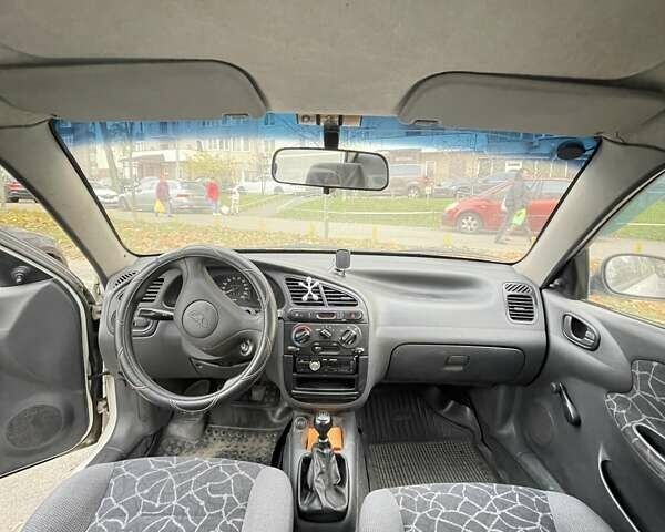 Білий Деу Ланос, об'ємом двигуна 1.5 л та пробігом 308 тис. км за 2319 $, фото 4 на Automoto.ua