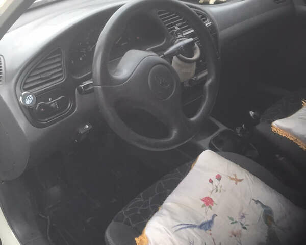 Белый Дэу Ланос, объемом двигателя 1.5 л и пробегом 353 тыс. км за 2200 $, фото 6 на Automoto.ua