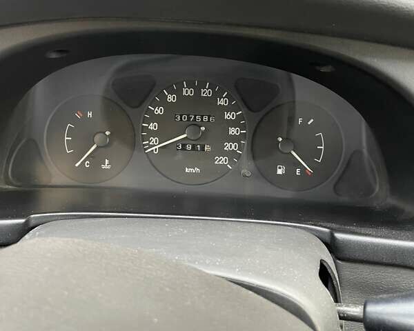 Білий Деу Ланос, об'ємом двигуна 1.5 л та пробігом 308 тис. км за 2319 $, фото 6 на Automoto.ua