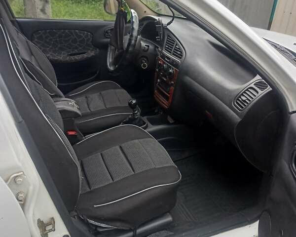 Белый Дэу Ланос, объемом двигателя 1.5 л и пробегом 389 тыс. км за 1800 $, фото 5 на Automoto.ua