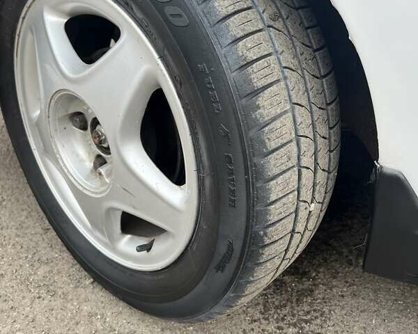 Білий Деу Ланос, об'ємом двигуна 1.5 л та пробігом 215 тис. км за 1400 $, фото 9 на Automoto.ua