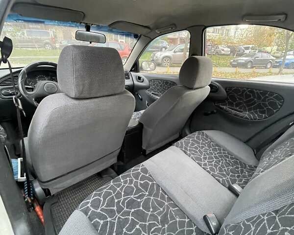 Білий Деу Ланос, об'ємом двигуна 1.5 л та пробігом 308 тис. км за 2319 $, фото 8 на Automoto.ua