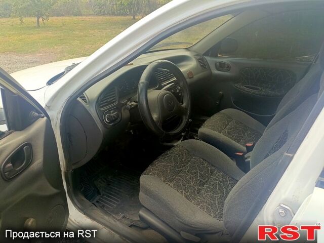 Білий Деу Ланос, об'ємом двигуна 1.5 л та пробігом 200 тис. км за 1350 $, фото 7 на Automoto.ua