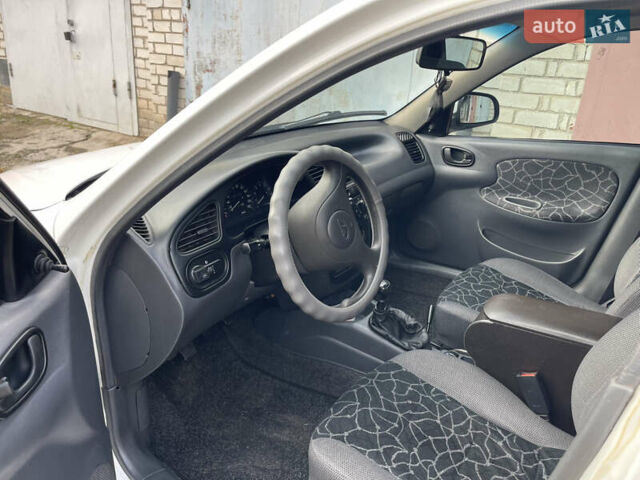 Білий Деу Ланос, об'ємом двигуна 1.5 л та пробігом 207 тис. км за 2850 $, фото 7 на Automoto.ua