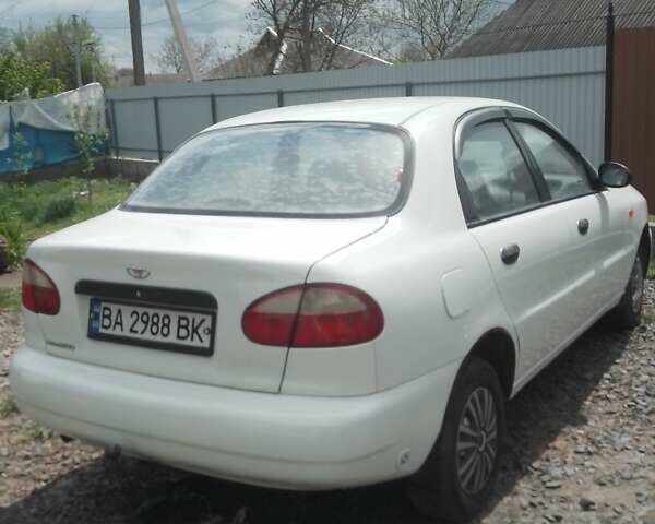 Белый Дэу Ланос, объемом двигателя 1.5 л и пробегом 250 тыс. км за 2000 $, фото 3 на Automoto.ua
