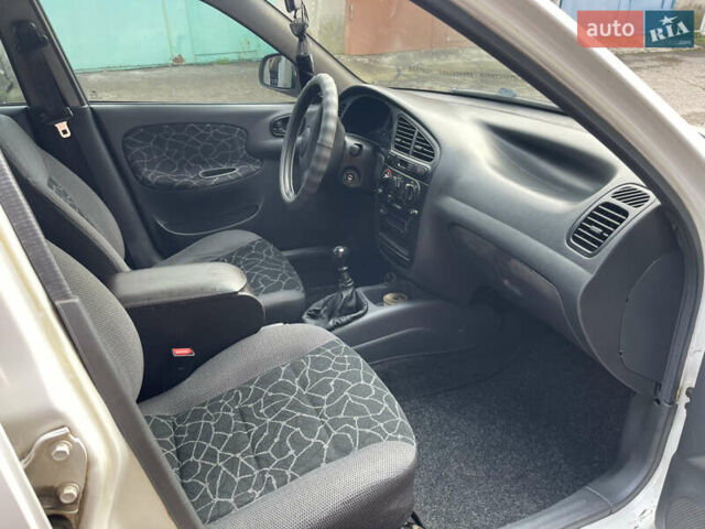 Белый Дэу Ланос, объемом двигателя 1.5 л и пробегом 207 тыс. км за 2950 $, фото 10 на Automoto.ua