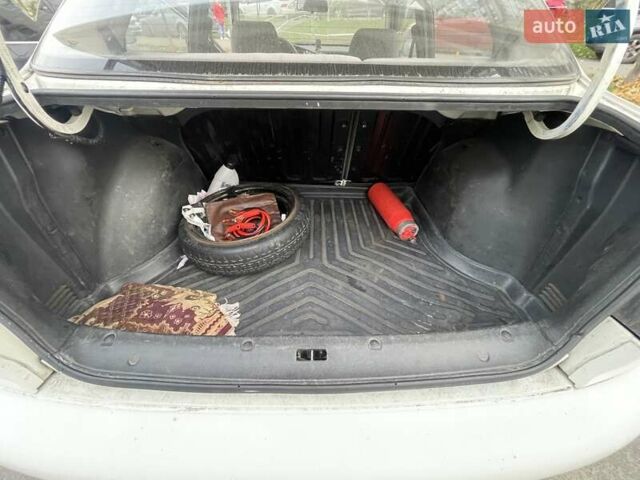 Білий Деу Ланос, об'ємом двигуна 1.5 л та пробігом 308 тис. км за 2319 $, фото 9 на Automoto.ua