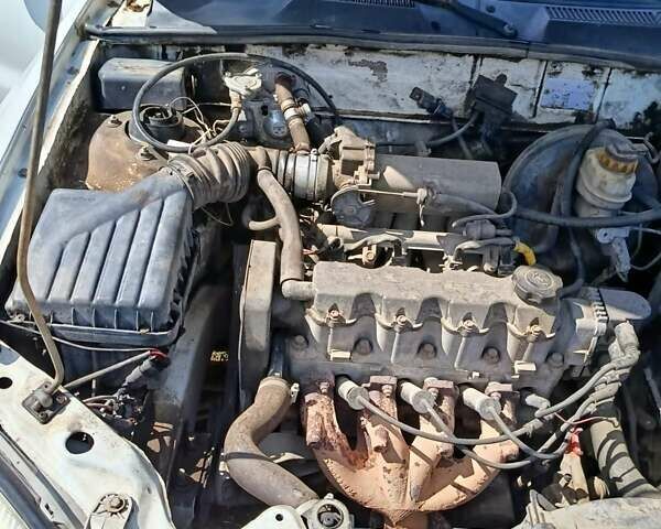 Білий Деу Ланос, об'ємом двигуна 1.5 л та пробігом 200 тис. км за 1900 $, фото 9 на Automoto.ua