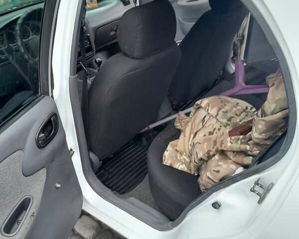 Белый Дэу Ланос, объемом двигателя 1.5 л и пробегом 528 тыс. км за 2000 $, фото 5 на Automoto.ua