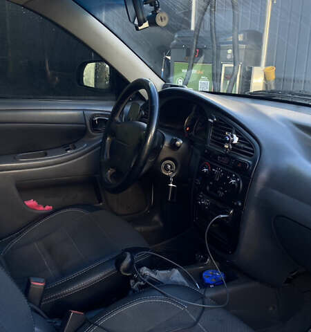 Белый Дэу Ланос, объемом двигателя 1.5 л и пробегом 110 тыс. км за 2700 $, фото 7 на Automoto.ua