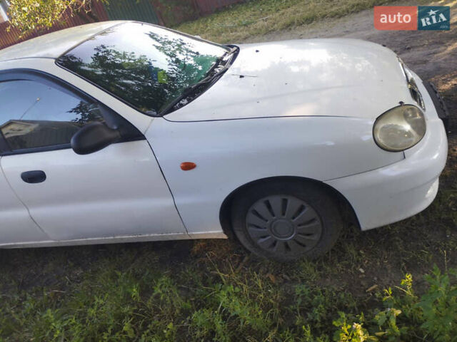 Білий Деу Ланос, об'ємом двигуна 1.6 л та пробігом 240 тис. км за 1450 $, фото 12 на Automoto.ua