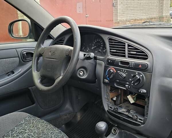 Белый Дэу Ланос, объемом двигателя 1.6 л и пробегом 140 тыс. км за 1600 $, фото 17 на Automoto.ua