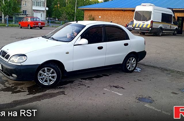 Белый Дэу Ланос, объемом двигателя 1.5 л и пробегом 230 тыс. км за 2450 $, фото 5 на Automoto.ua