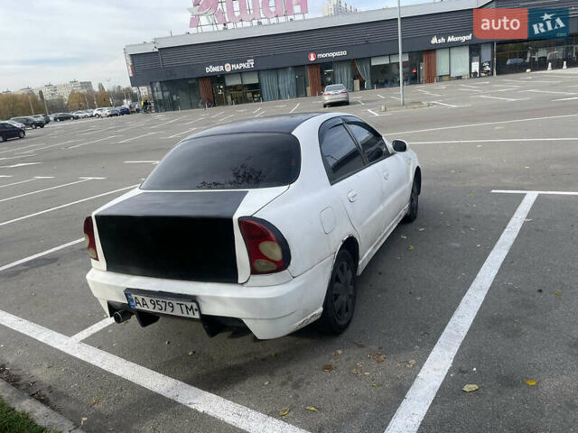 Білий Деу Ланос, об'ємом двигуна 1.5 л та пробігом 218 тис. км за 1533 $, фото 2 на Automoto.ua