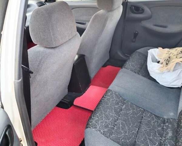 Белый Дэу Ланос, объемом двигателя 1.5 л и пробегом 125 тыс. км за 2600 $, фото 6 на Automoto.ua
