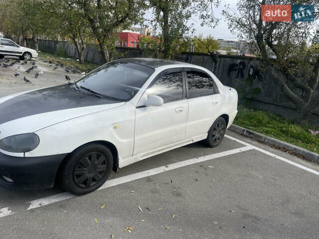 Білий Деу Ланос, об'ємом двигуна 1.5 л та пробігом 218 тис. км за 1533 $, фото 4 на Automoto.ua