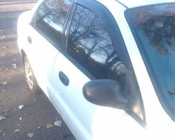 Белый Дэу Ланос, объемом двигателя 1.6 л и пробегом 220 тыс. км за 2200 $, фото 11 на Automoto.ua