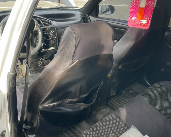 Білий Деу Ланос, об'ємом двигуна 1.5 л та пробігом 218 тис. км за 1533 $, фото 8 на Automoto.ua