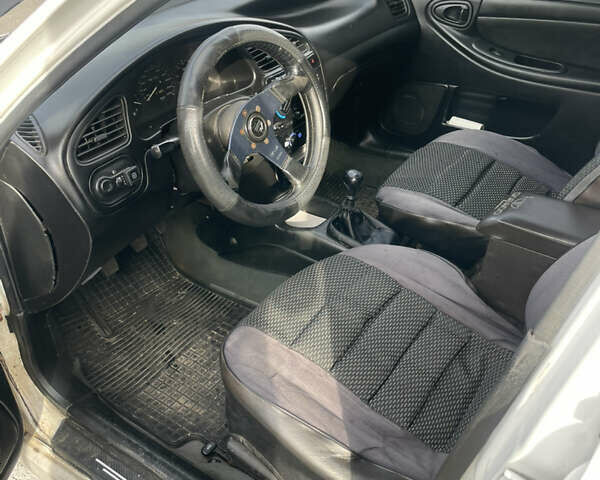 Білий Деу Ланос, об'ємом двигуна 1.5 л та пробігом 218 тис. км за 1533 $, фото 6 на Automoto.ua