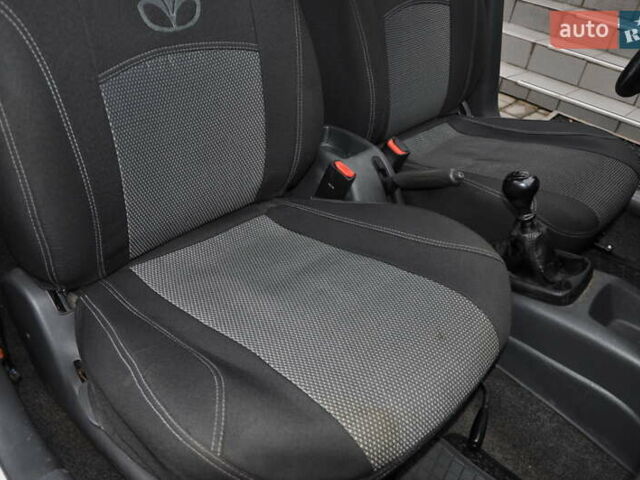 Белый Дэу Ланос, объемом двигателя 1.5 л и пробегом 145 тыс. км за 2700 $, фото 21 на Automoto.ua