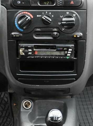 Белый Дэу Ланос, объемом двигателя 1.5 л и пробегом 145 тыс. км за 2700 $, фото 28 на Automoto.ua