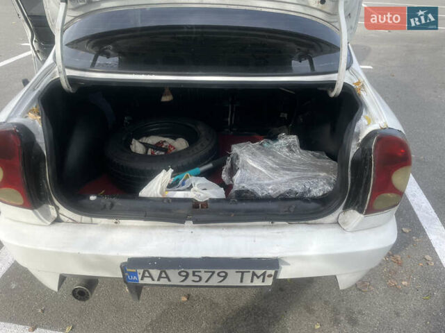 Білий Деу Ланос, об'ємом двигуна 1.5 л та пробігом 218 тис. км за 1533 $, фото 9 на Automoto.ua