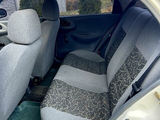 Белый Дэу Ланос, объемом двигателя 1.5 л и пробегом 204 тыс. км за 2450 $, фото 5 на Automoto.ua