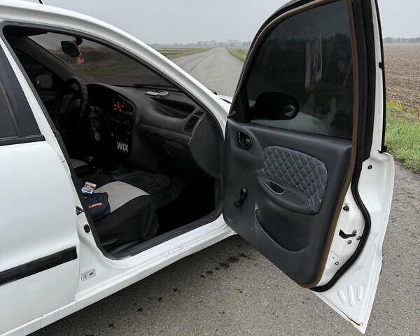Белый Дэу Ланос, объемом двигателя 1.5 л и пробегом 151 тыс. км за 1850 $, фото 9 на Automoto.ua