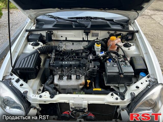 Белый Дэу Ланос, объемом двигателя 1.5 л и пробегом 204 тыс. км за 2450 $, фото 7 на Automoto.ua