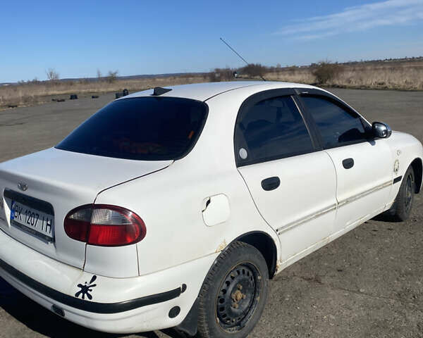 Белый Дэу Ланос, объемом двигателя 1.5 л и пробегом 323 тыс. км за 1650 $, фото 3 на Automoto.ua