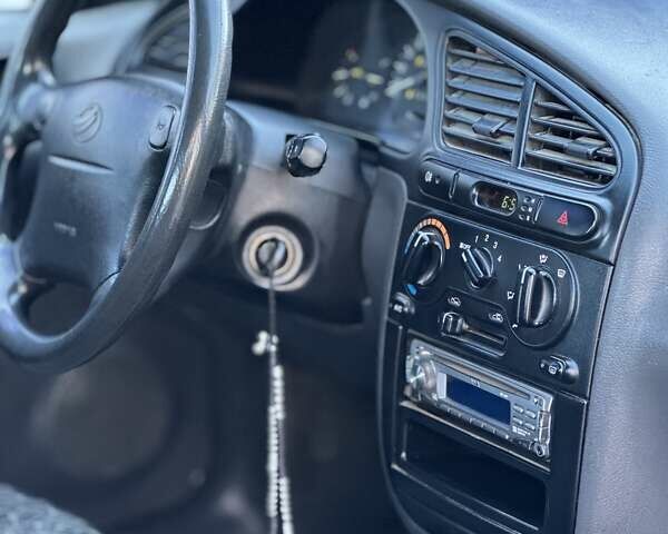 Деу Ланос 2006 у Одесі на Automoto.ua Білий Деу Ланос, об'ємом двигуна 1.5 л та пробігом 201 тис. км за 2299 $, фото 12 на Automoto.ua