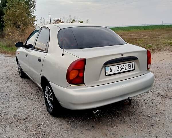 Белый Дэу Ланос, объемом двигателя 1.6 л и пробегом 310 тыс. км за 2300 $, фото 2 на Automoto.ua