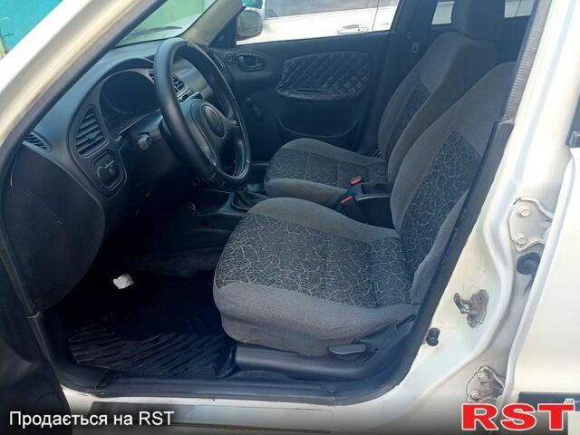 Белый Дэу Ланос, объемом двигателя 1.5 л и пробегом 257 тыс. км за 1750 $, фото 5 на Automoto.ua