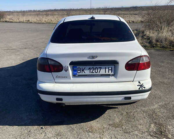 Белый Дэу Ланос, объемом двигателя 1.5 л и пробегом 323 тыс. км за 1650 $, фото 5 на Automoto.ua