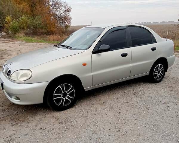 Белый Дэу Ланос, объемом двигателя 1.6 л и пробегом 310 тыс. км за 2300 $, фото 3 на Automoto.ua