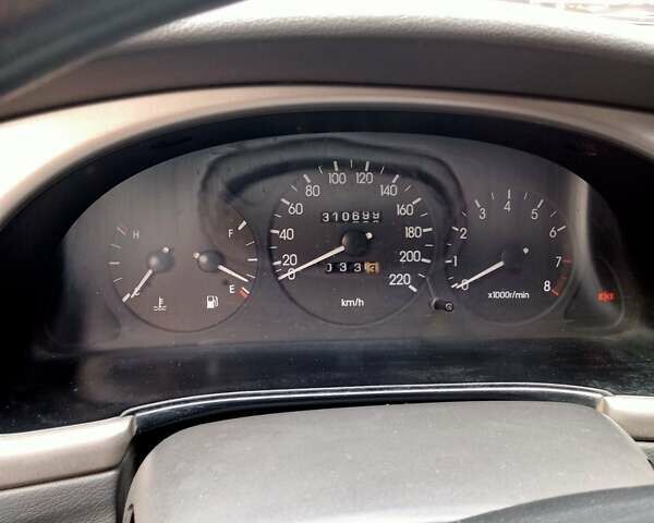 Белый Дэу Ланос, объемом двигателя 1.6 л и пробегом 310 тыс. км за 2300 $, фото 10 на Automoto.ua