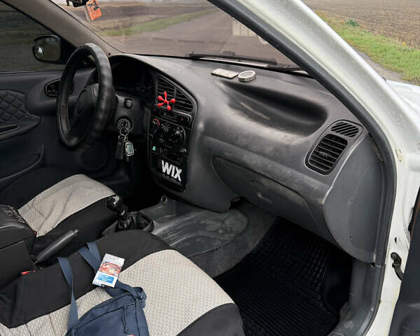Белый Дэу Ланос, объемом двигателя 1.5 л и пробегом 151 тыс. км за 1850 $, фото 10 на Automoto.ua