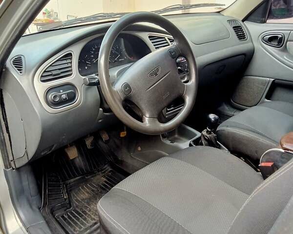 Белый Дэу Ланос, объемом двигателя 1.6 л и пробегом 310 тыс. км за 2300 $, фото 9 на Automoto.ua
