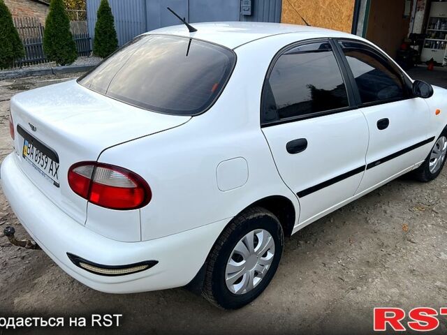 Белый Дэу Ланос, объемом двигателя 1.5 л и пробегом 204 тыс. км за 2450 $, фото 2 на Automoto.ua
