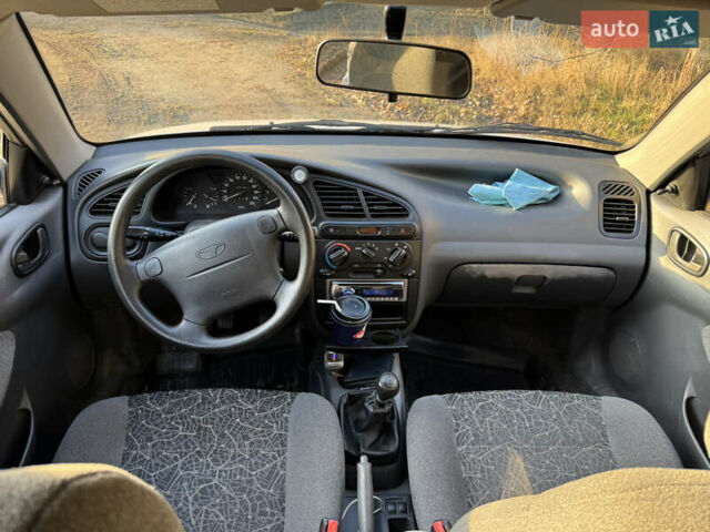 Белый Дэу Ланос, объемом двигателя 1.6 л и пробегом 152 тыс. км за 2000 $, фото 7 на Automoto.ua