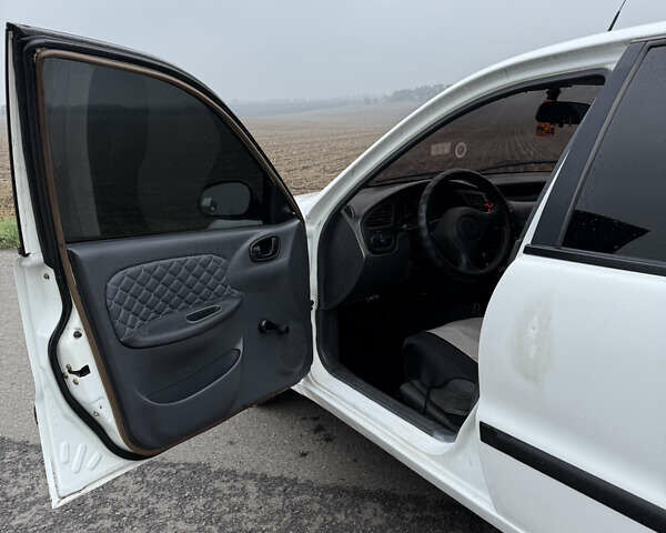 Белый Дэу Ланос, объемом двигателя 1.5 л и пробегом 151 тыс. км за 1850 $, фото 7 на Automoto.ua