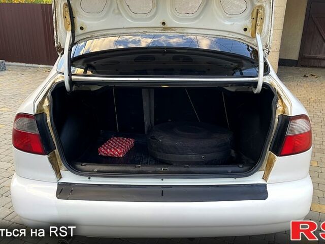 Дэу Ланос 2006 в Врадиевке на Automoto.ua Белый Дэу Ланос, объемом двигателя 1.5 л и пробегом 185 тыс. км за 2200 $, фото 9 на Automoto.ua