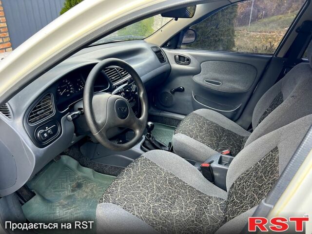 Белый Дэу Ланос, объемом двигателя 1.5 л и пробегом 204 тыс. км за 2450 $, фото 4 на Automoto.ua